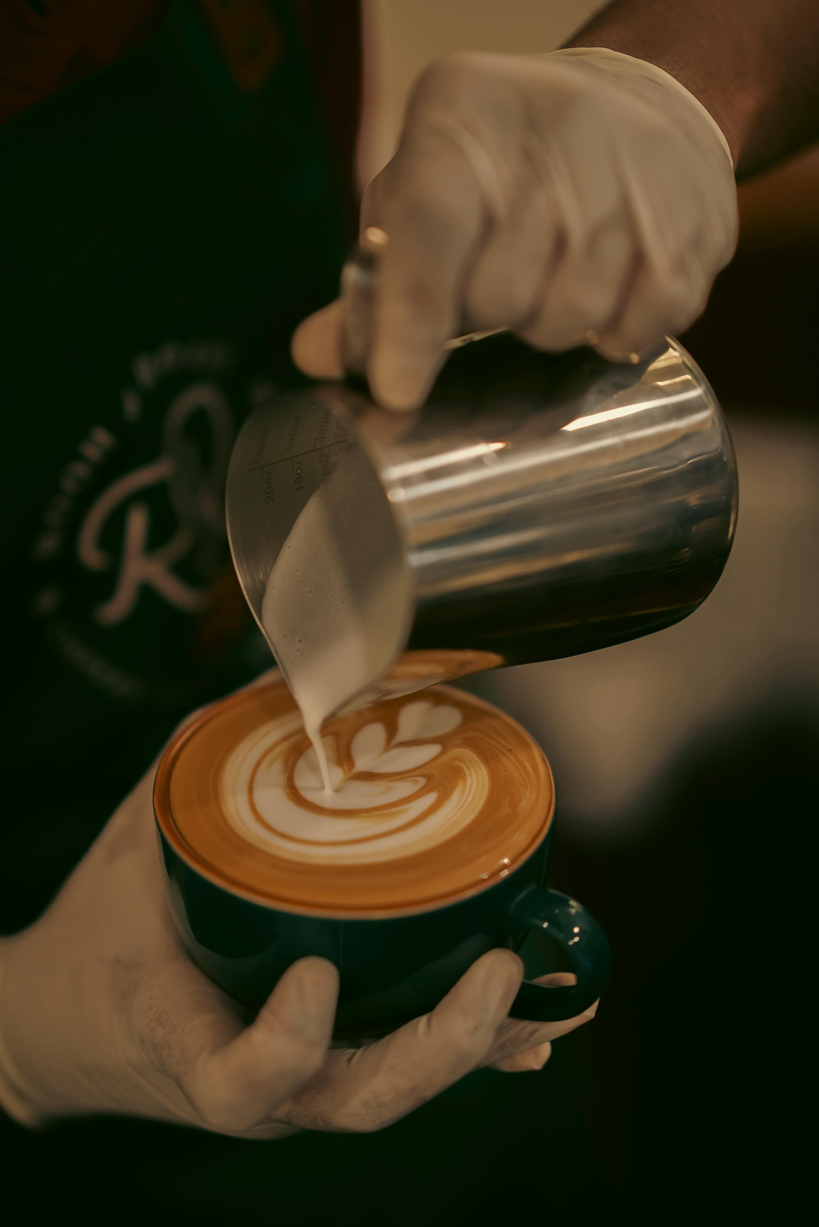 Latte art being poured